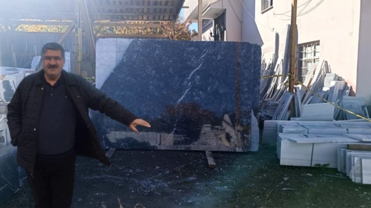 Kars'ta üzerine mermer tabla düşen iş yeri sahibi hayatını kaybetti