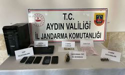 Aydın'da FETÖ şüphelisinin otomobilinde el bombası ve F serisi 1 dolar bulundu