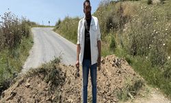 İzmir'de bir kişi arazisinden izinsiz geçirildiğini iddia ettiği yolu trafiğe kapattı