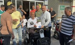 Adana'da 14 engelliye akülü araç desteği