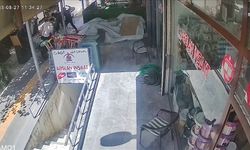 Diyarbakır'da çocuğu zorla götürmeye çalışan şüpheliye esnafın müdahalesi kamerada