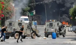 Filistin topraklarını gasbeden İsraillilerin silahlandırılması Batı Şeria'daki Filistinlileri endişelendiriyor