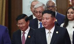 Çin'deki askeri geçit törenine katılan Kim, ilk kez çok taraflı diplomatik bir etkinlikte yer aldı