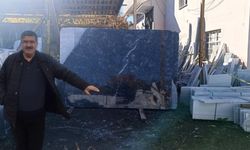 Kars'ta üzerine mermer tabla düşen iş yeri sahibi hayatını kaybetti