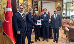 MHP Ankara İl Başkanı Doğan, "ABB Meclisi MHP Çalışma Raporu"nu MHP Lideri Bahçeli'ye sundu