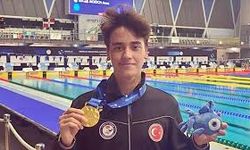 Milli yüzücü Kuzey Tunçelli, Teksas Üniversitesi'nin takımına girdi