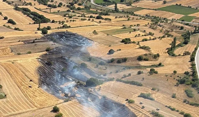 Balıkesir'de arazide çıkan yangına müdahale ediliyor